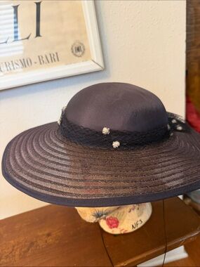 Elegant Women’s Wide-Brim Navy Hat with Decorative Trim Plaza Suite by Betmar